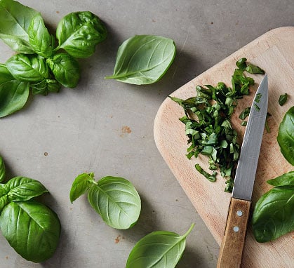 Chopped basil on a cutting board